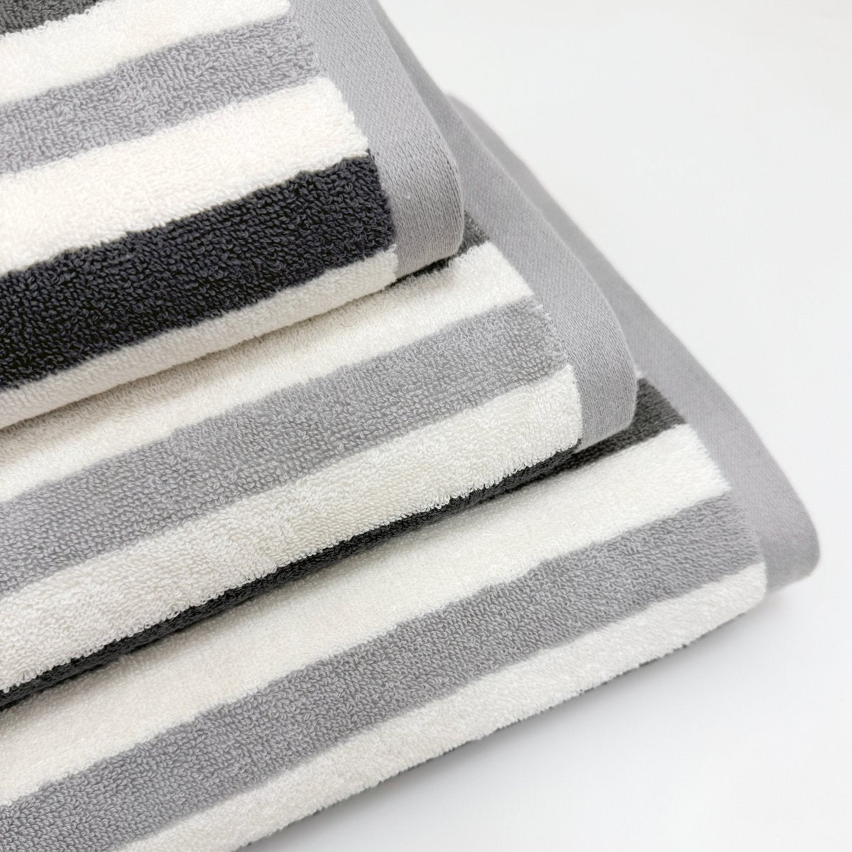 Soft and stylish grey striped patterned towels.