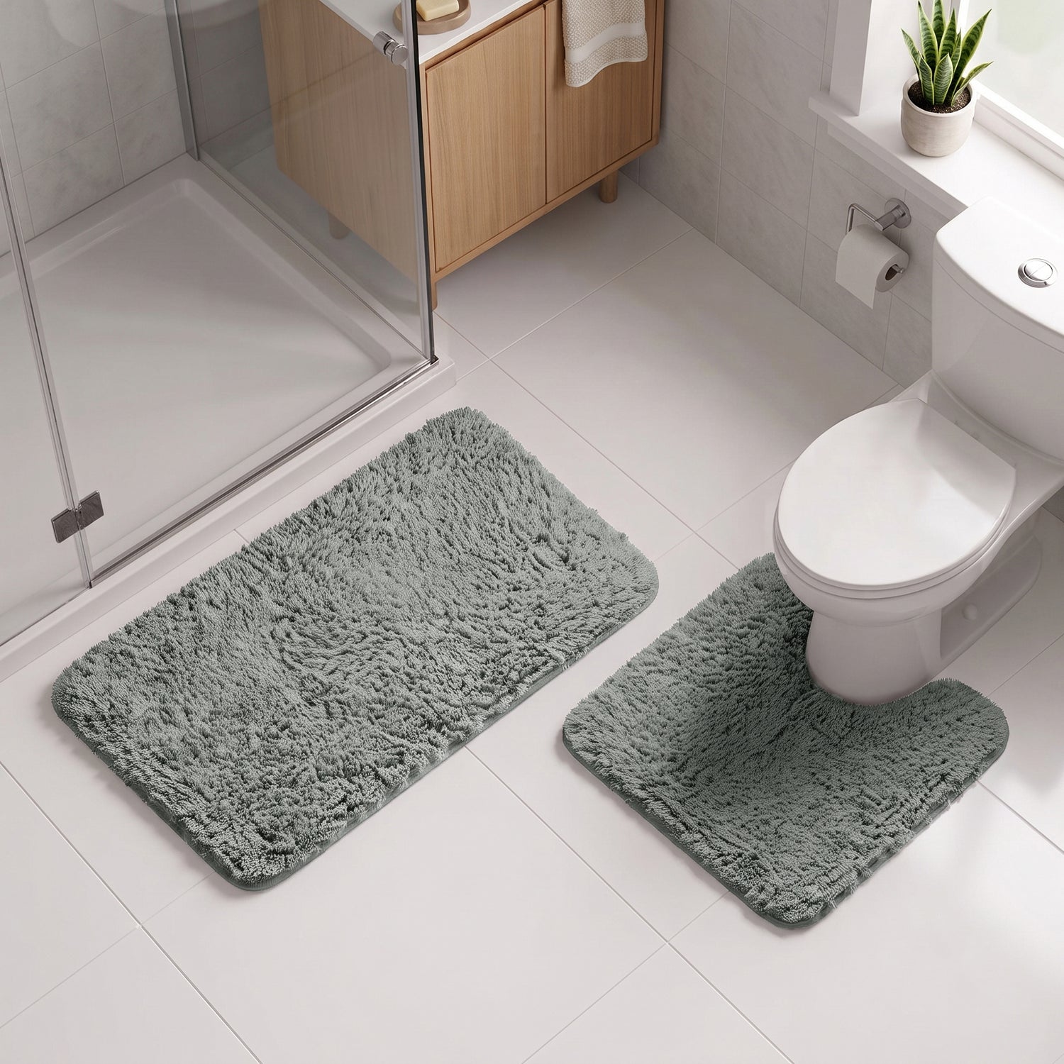 Charcoal grey 2pc set of bath mat and pedestal mat with non slip backing.
