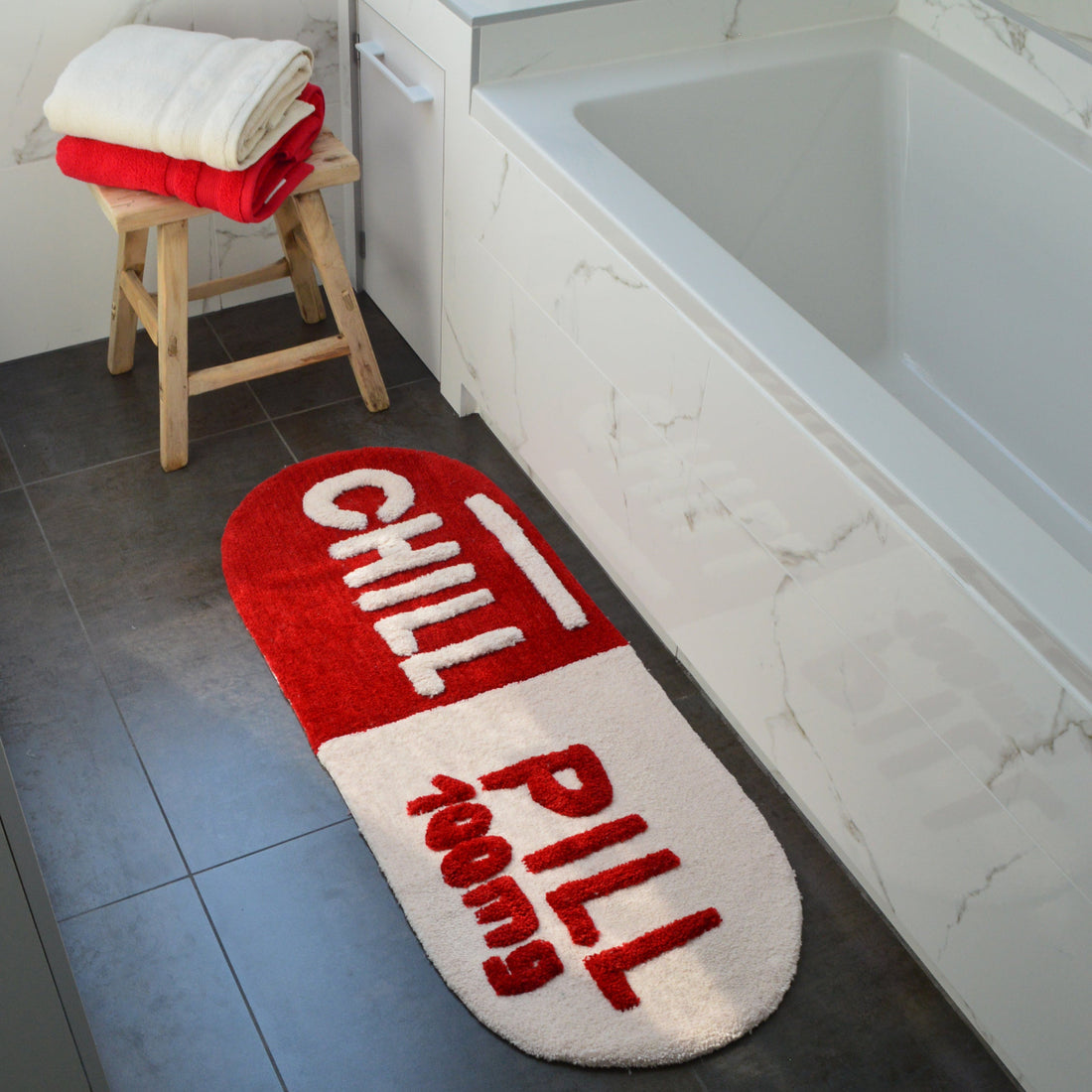 Red chill pill rug, hand tufted novelty design, bath runner.