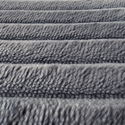 Soft ribbed bath mat made from memory foam, dark grey.