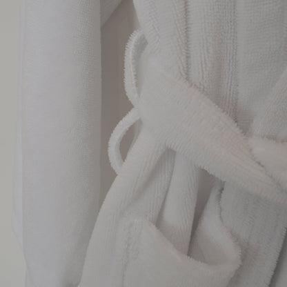 Super soft velour dressing gown in white with belt loops. 