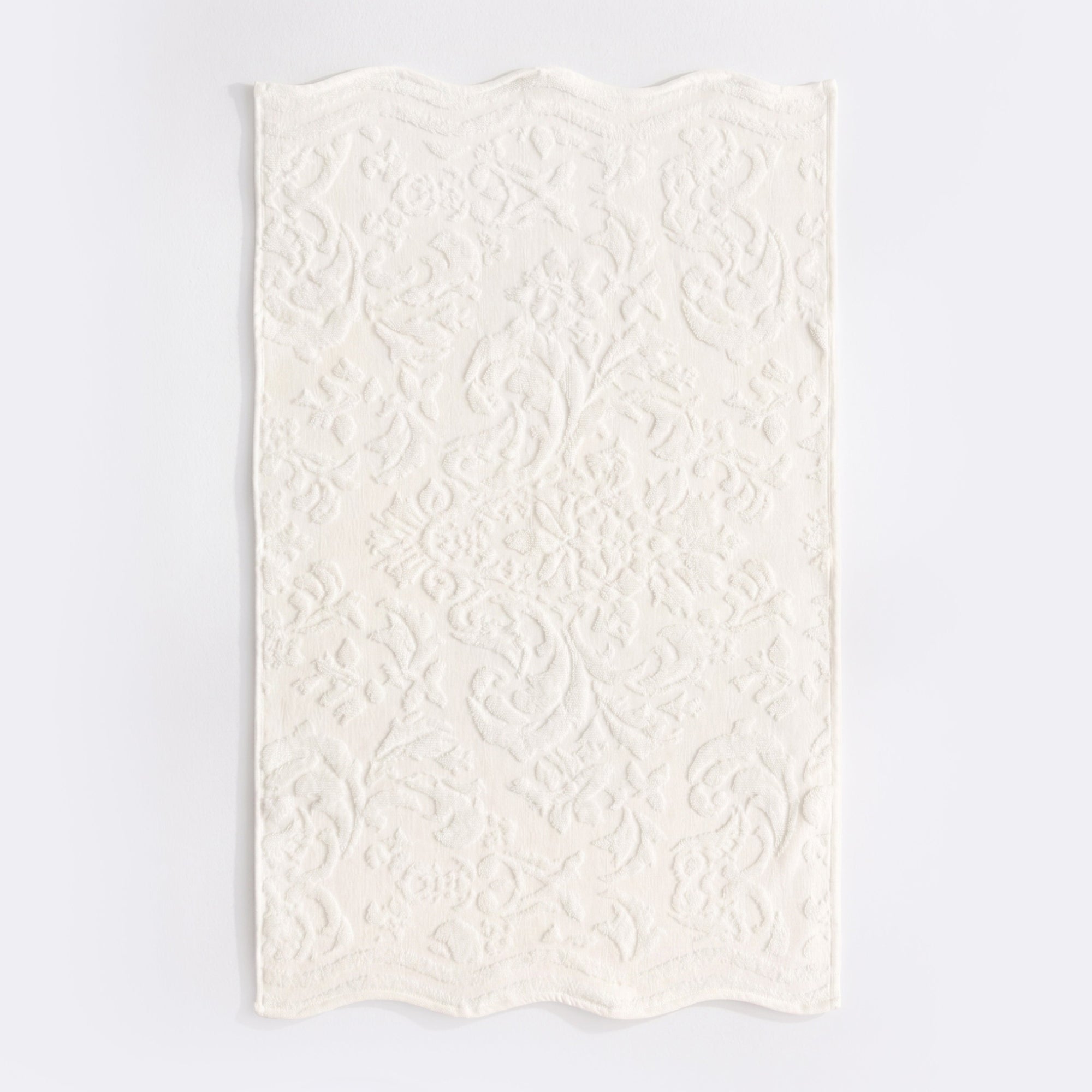Cream scalloped bathroom towels in textured floral jacquard design - 100% cotton towels.