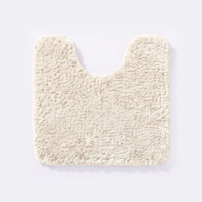 Cream non slip pedestal mat for the toilet or sink basin, plush shaggy microfibre pile.