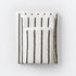 Striped bathroom towels in cream and black colours - timeless pin stripe pattern.