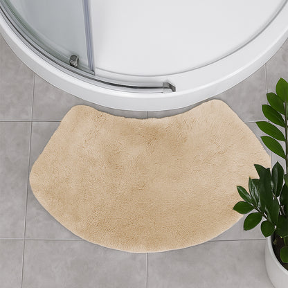 Beige bath mat for shower units in curved shape.