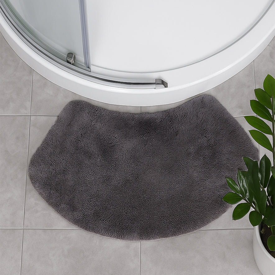 Grey curved bath mat for a round shower unit - made from 100% cotton.