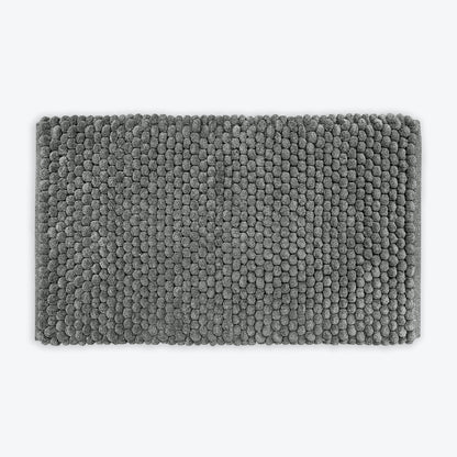 Dark grey thick bath mat with luxury bobble texture. Super soft and absorbent washable rug.