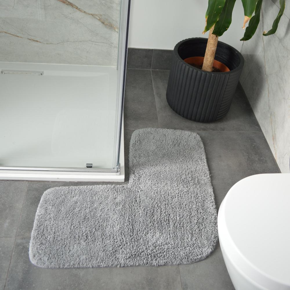 grey corner shaped shower mat