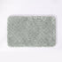 Light grey non slip bath mat made from super soft microfibre.