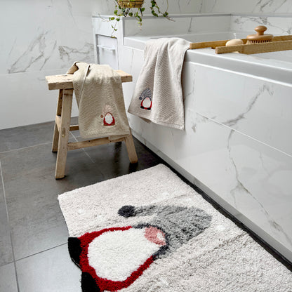 Novelty towels for a Christmas bathroom with a fun gink gnome design.