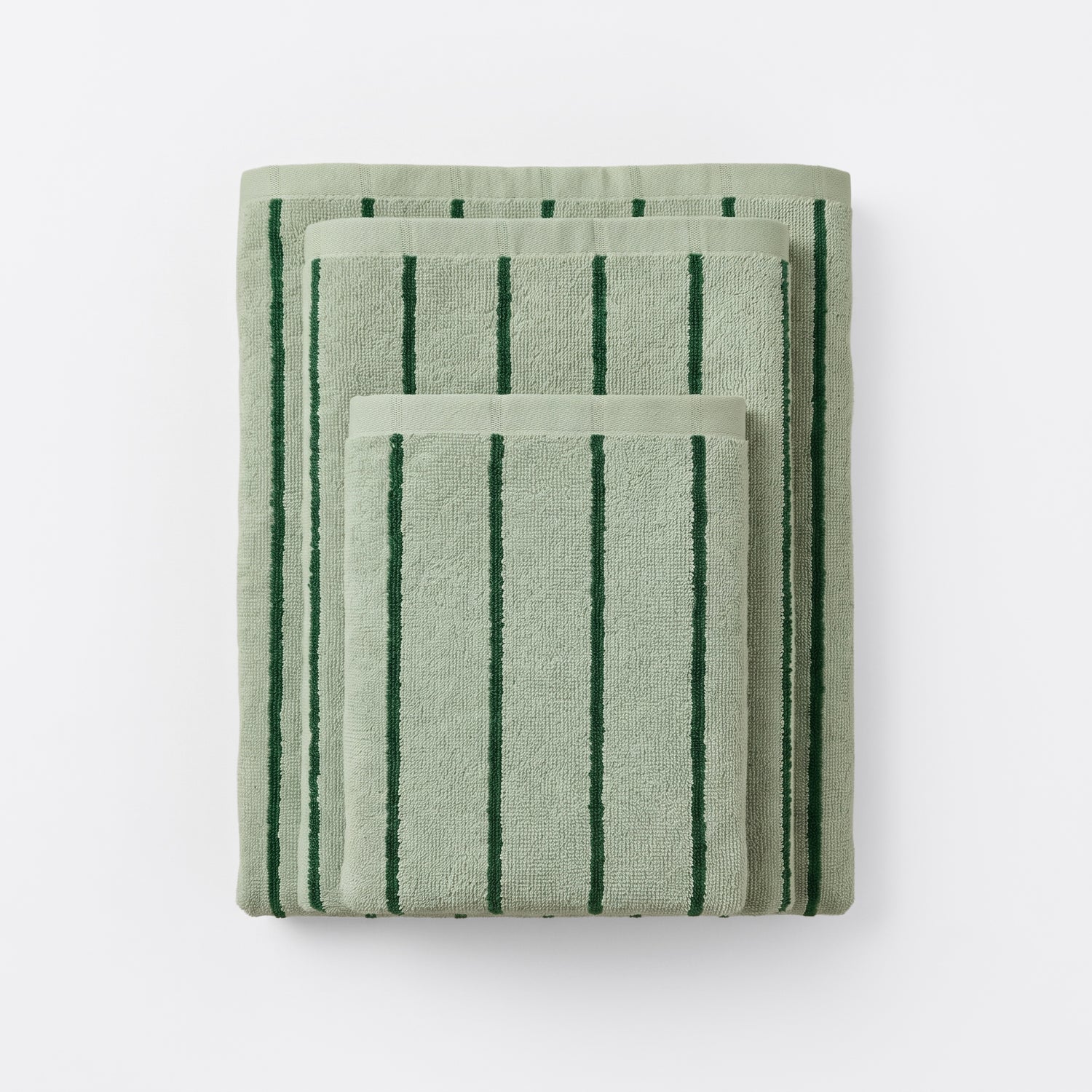 Striped bathroom towels in sage green and dark green colours - timeless pin stripe pattern.
