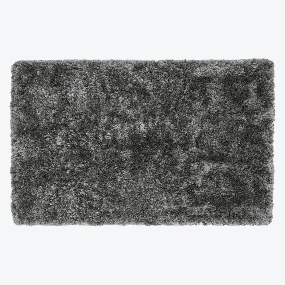 large shaggy rug in grey