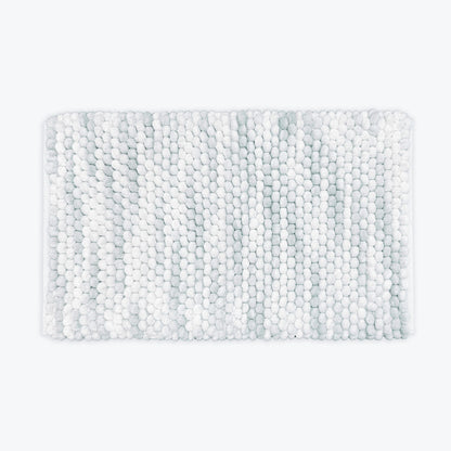Grey and white marble bath mat in chunky bobble design.