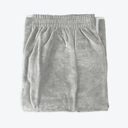 Grey shower towel wrap with Velcro fastening made from 100% cotton.