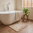 Beige slogan bathroom mat with scalloped edges - fun hello lovely slogan.