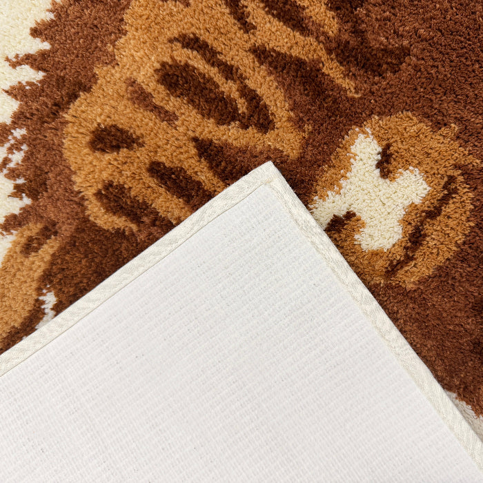 Non slip bath mat with highland fluffy cow on. Cute rug for the bathroom or hallway.