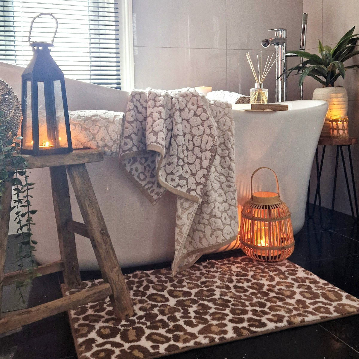 Leopard print bathroom towels and mat