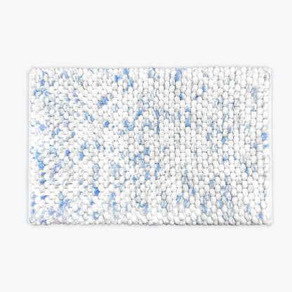 Blue marble bath mats in a deep chunky pile.