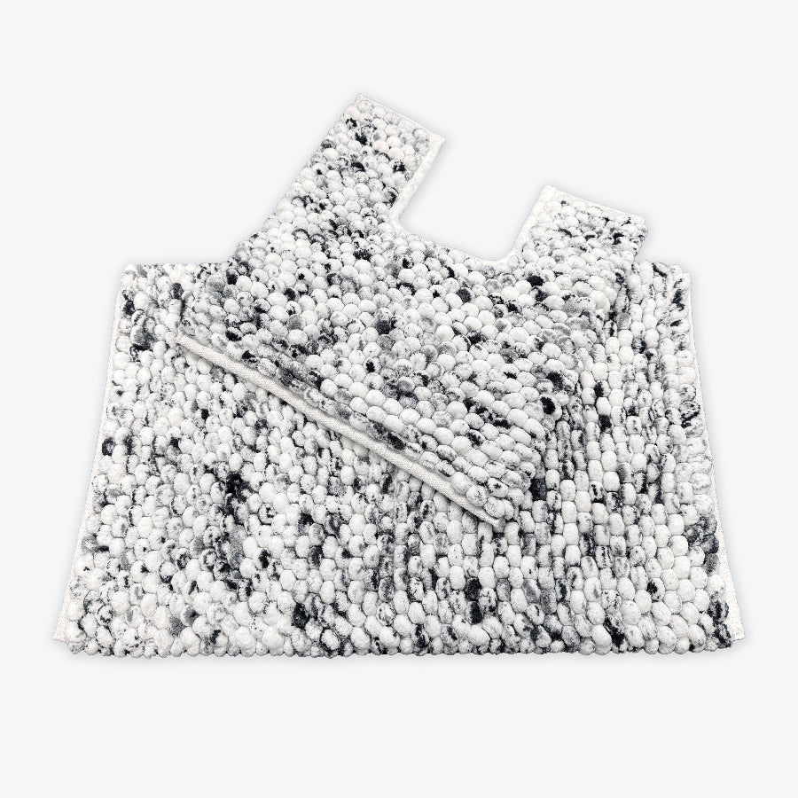 White and black bathroom mats set - coordinated bath mat and toilet mat in marble design.