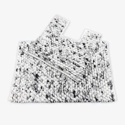White and black bathroom mats set - coordinated bath mat and toilet mat in marble design.