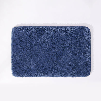 Mid blue non slip bath mat with soft deep pile.