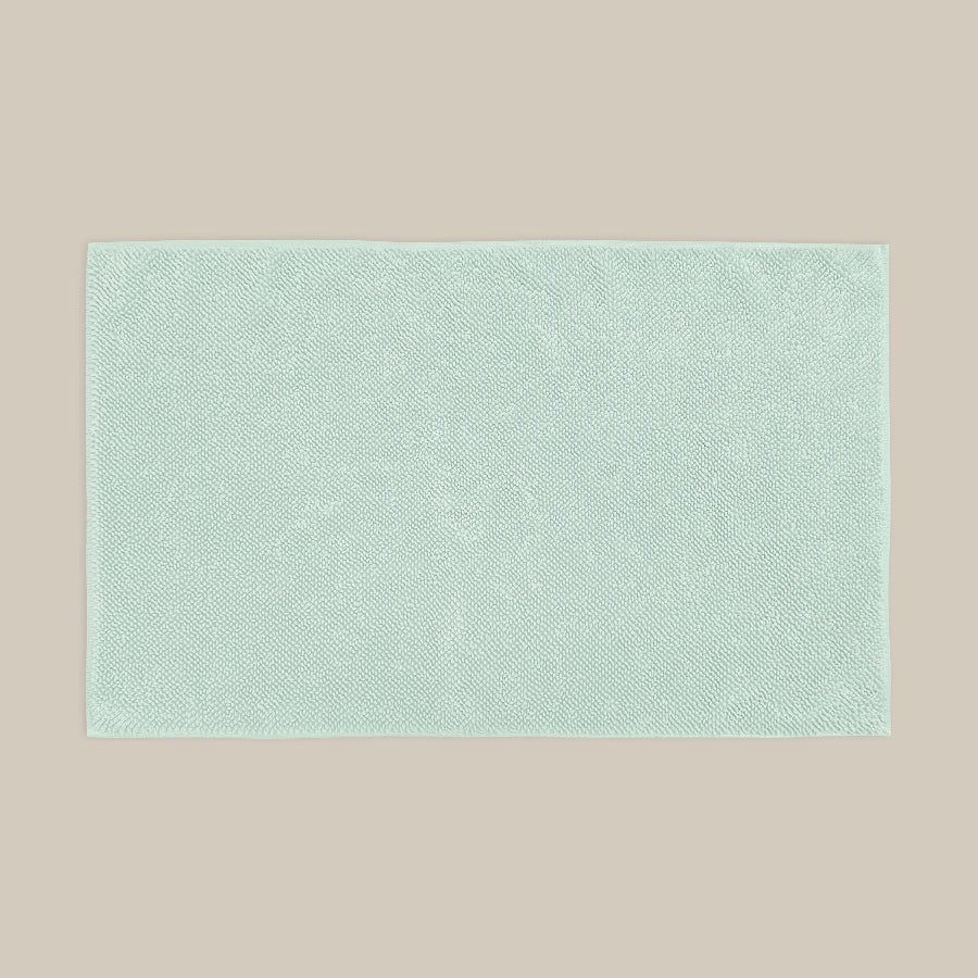 Duck egg blue bath mat made from organic cotton. Soft and sustainable bathroom accessories.