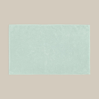 Duck egg blue bath mat made from organic cotton. Soft and sustainable bathroom accessories.