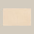 Neutral beige bath mat made from organic cotton. Soft and sustainable bathroom accessories.