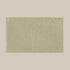 Sage green bath mat made from organic cotton. Soft and sustainable bathroom accessories.