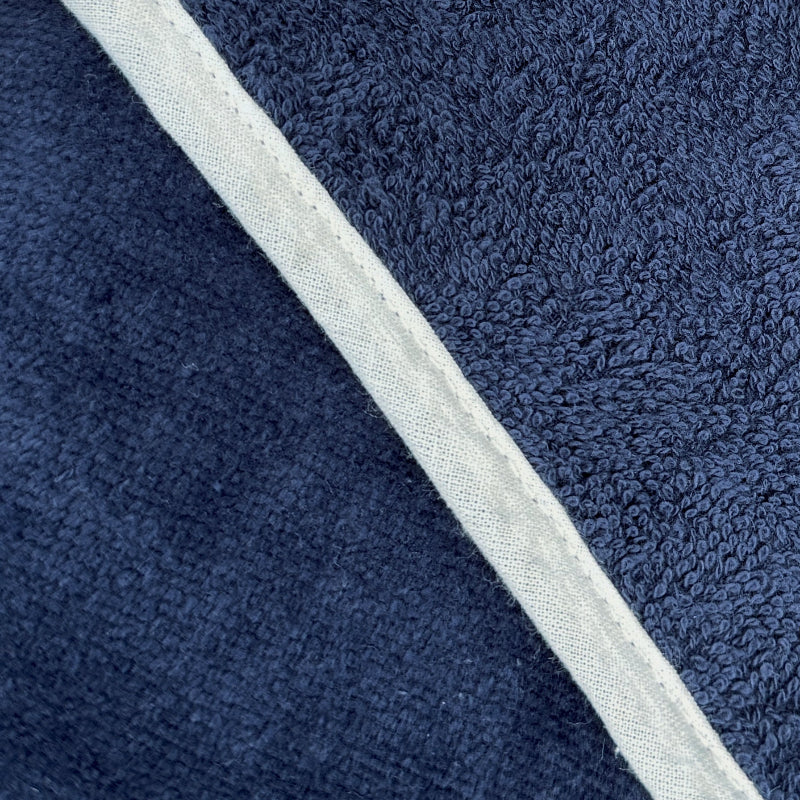 Navy blue towelling shower wrap with adjustable fit - soft and secure.