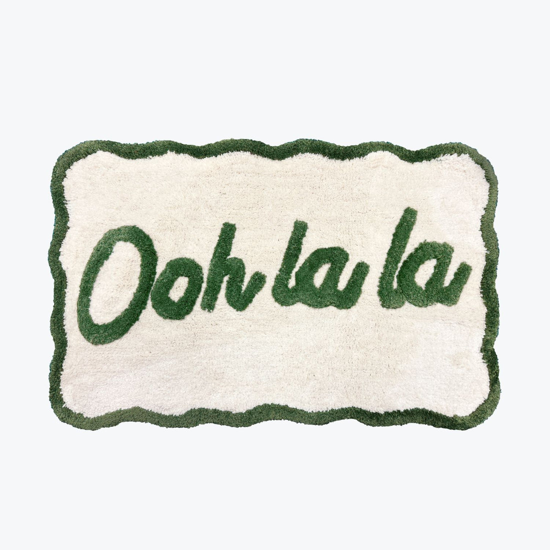 Ooh la la slogan mat with scallop edges in green and cream.