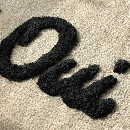 Oui Oui Slogan Scalloped Bath Mat