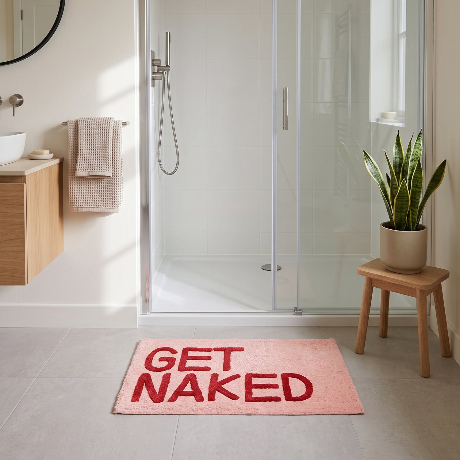 Get Naked Slogan Bath Mat