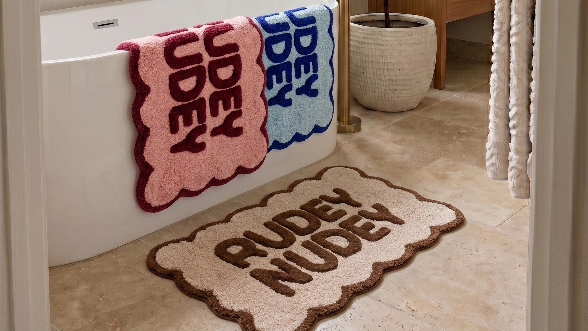 Fun slogan bathroom mats and new season towels.