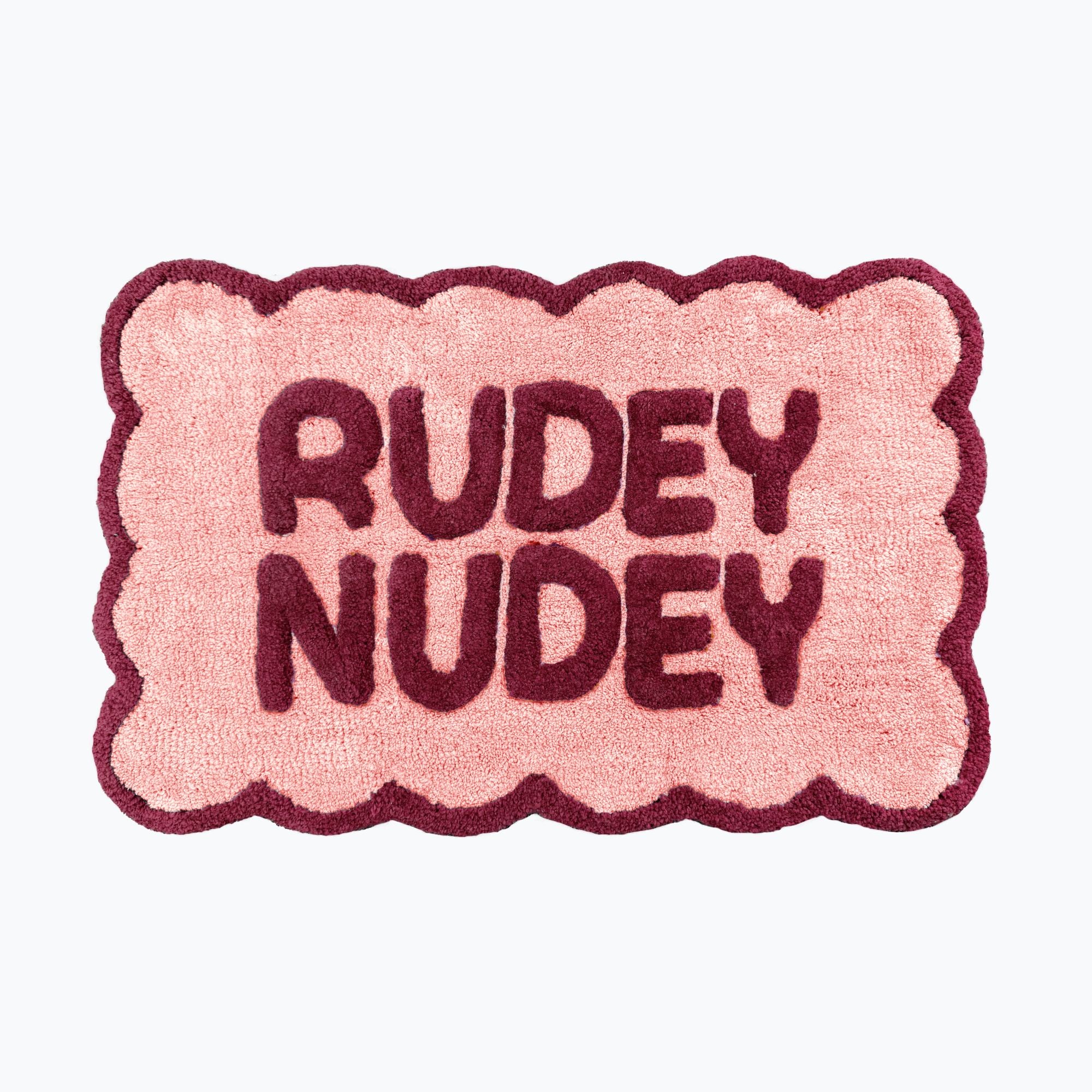 Burgundy and pink bathroom mats with scalloped edges - fun rudey nudey slogan design.