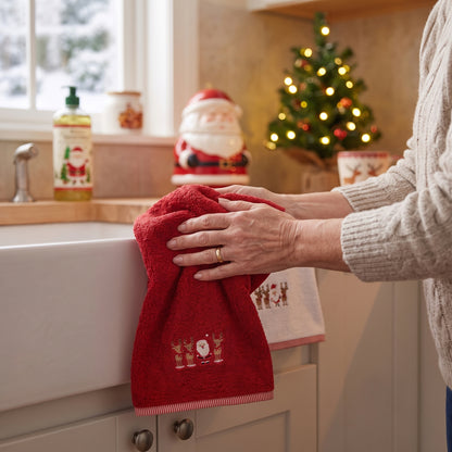 Cute Christmas tea towels for the kitchen in red and white Santa design.