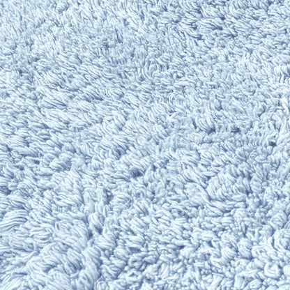 Baby blue cotton bath mats and shower mats.