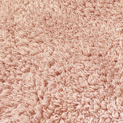 Blush pink cotton bath mats set.