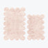 Blush pink scalloped bath mat set, two piece.