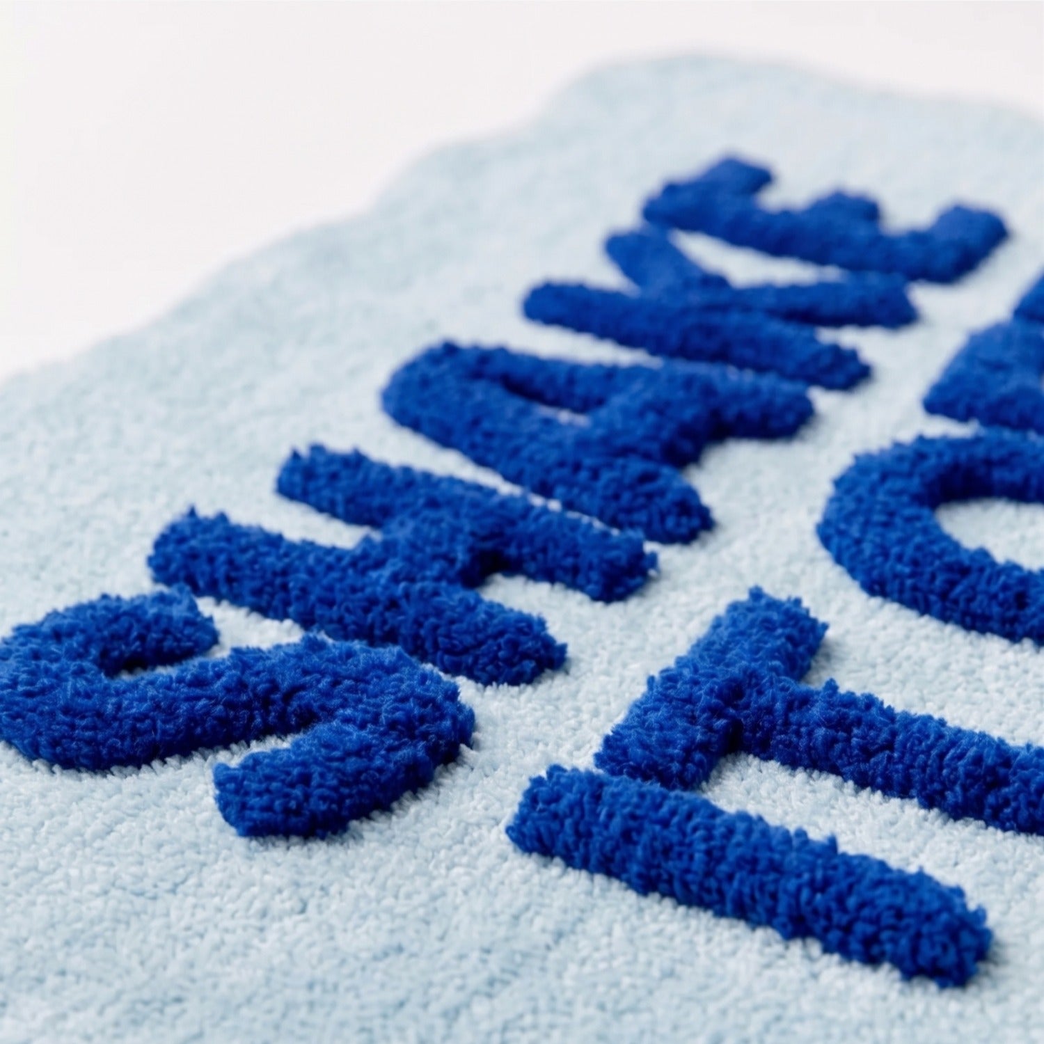 Shake It Off Scallop Bath Mat