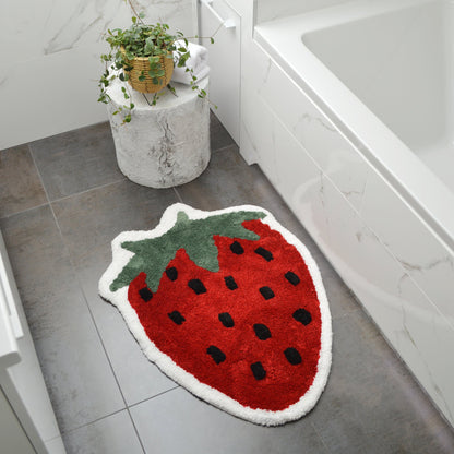 Fun fruit bath mat, with red strawberry shape.