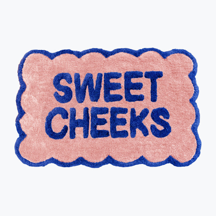 Statement bath mat, scalloped shape. Fun slogan mats for the bathroom.