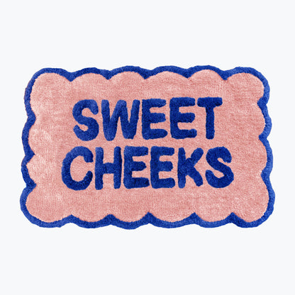 Statement bath mat, scalloped shape. Fun slogan mats for the bathroom.