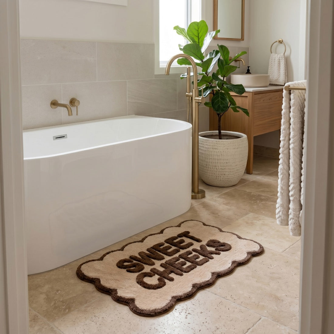 Brown bath mat with slogan design - sweer cheeks scalloped bathroom rugs.
