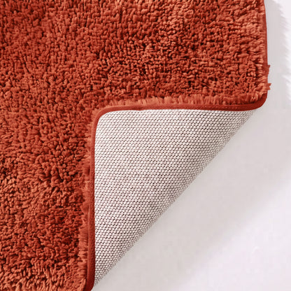 Rust orange non slip toilet pedestal mat with shaggy pile- 100% microfibre.