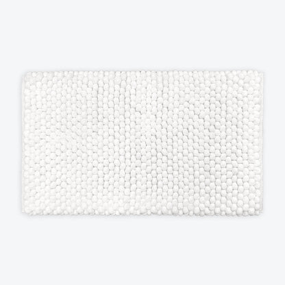 White thick bath mat with luxury bobble texture. Super soft and absorbent washable rug.