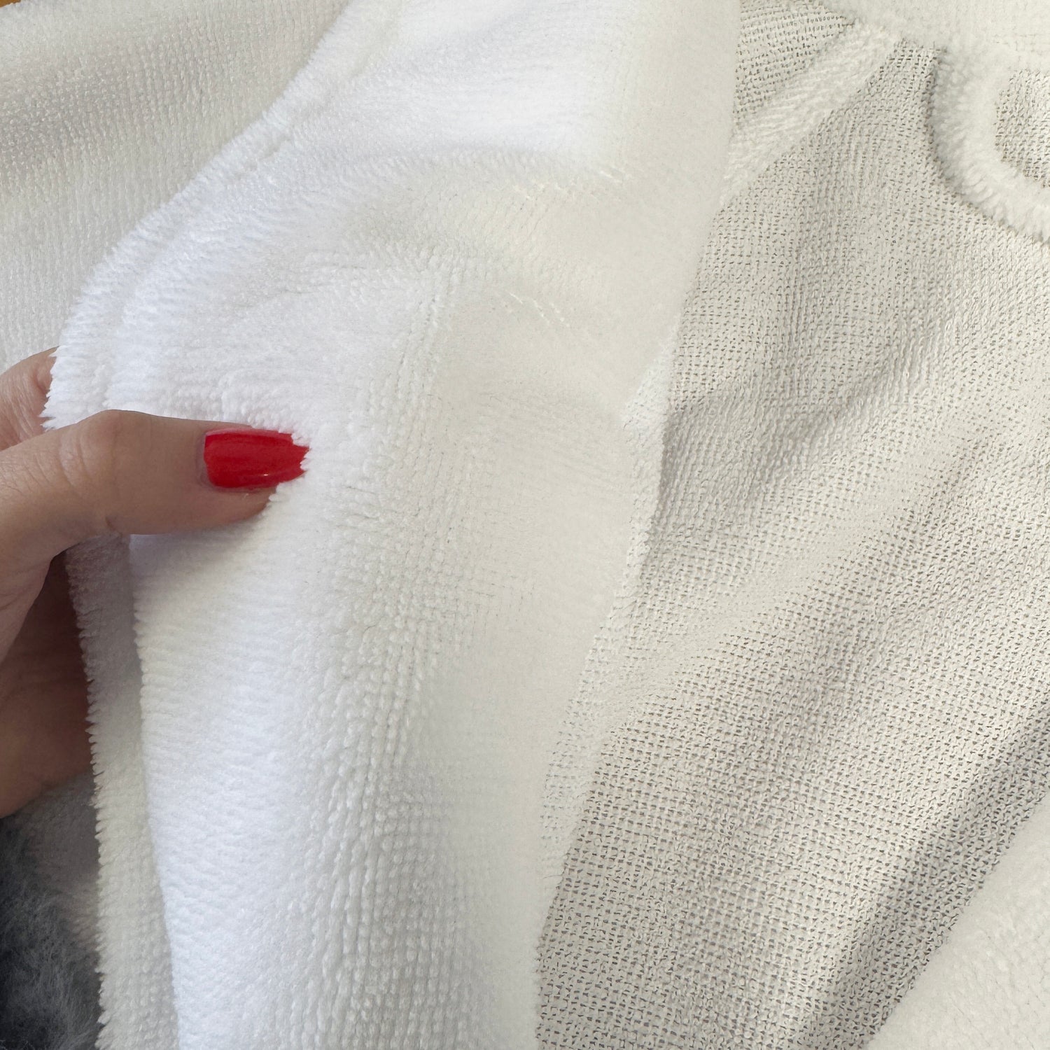 White dressing gown with super soft velour pile.
