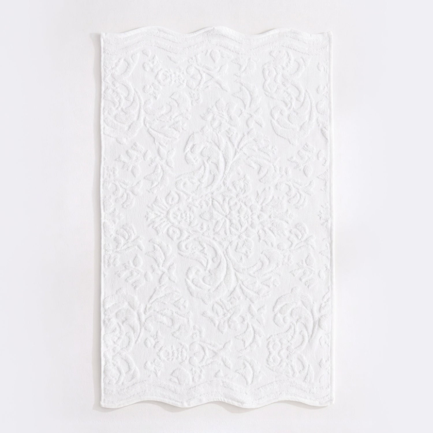 White scalloped bathroom towels in textured floral jacquard design - 100% cotton towels.
