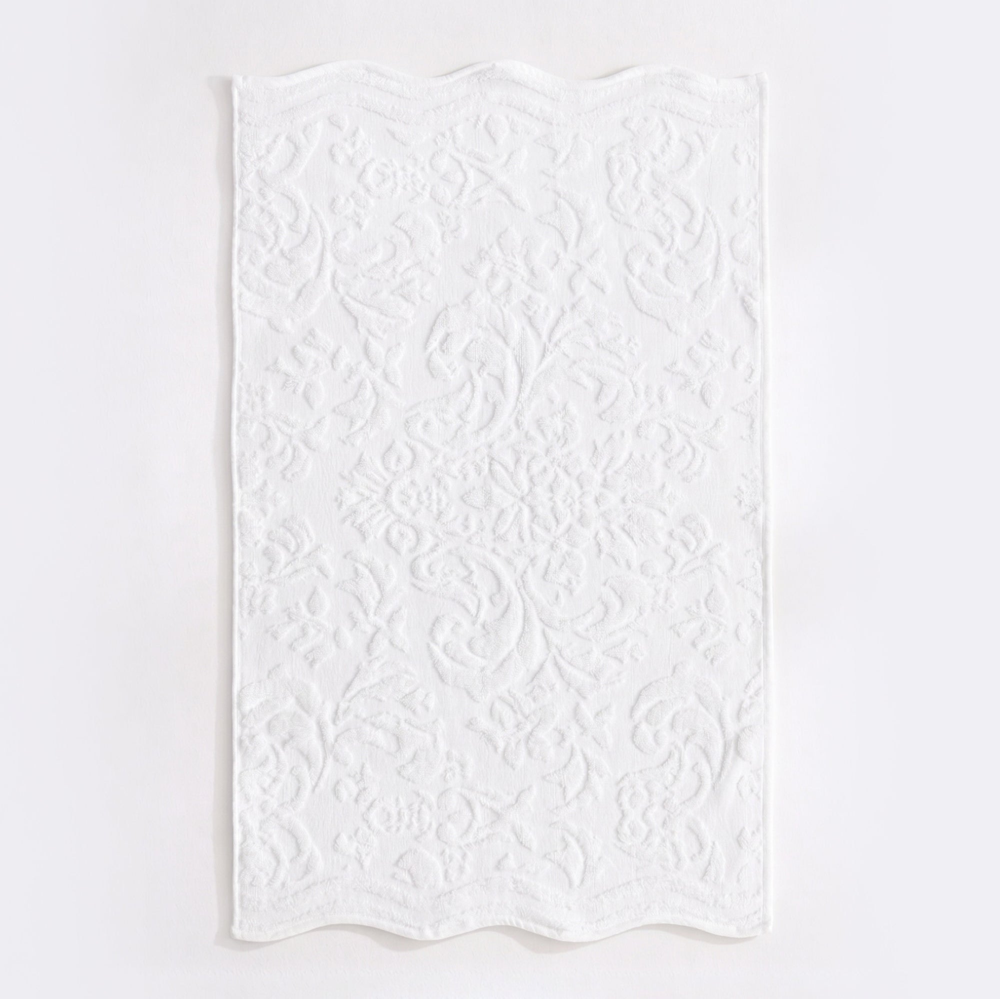 White scalloped bathroom towels in textured floral jacquard design - 100% cotton towels.