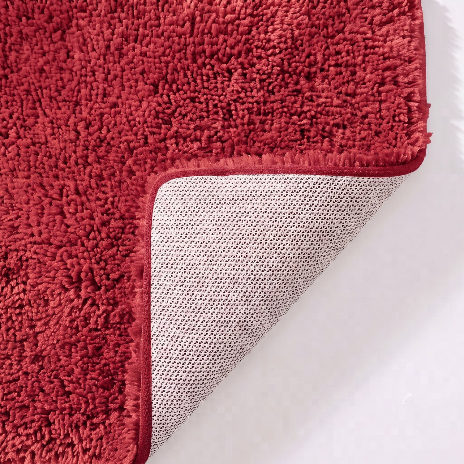 Wine red non slip toilet pedestal mat with shaggy pile- 100% microfibre.
